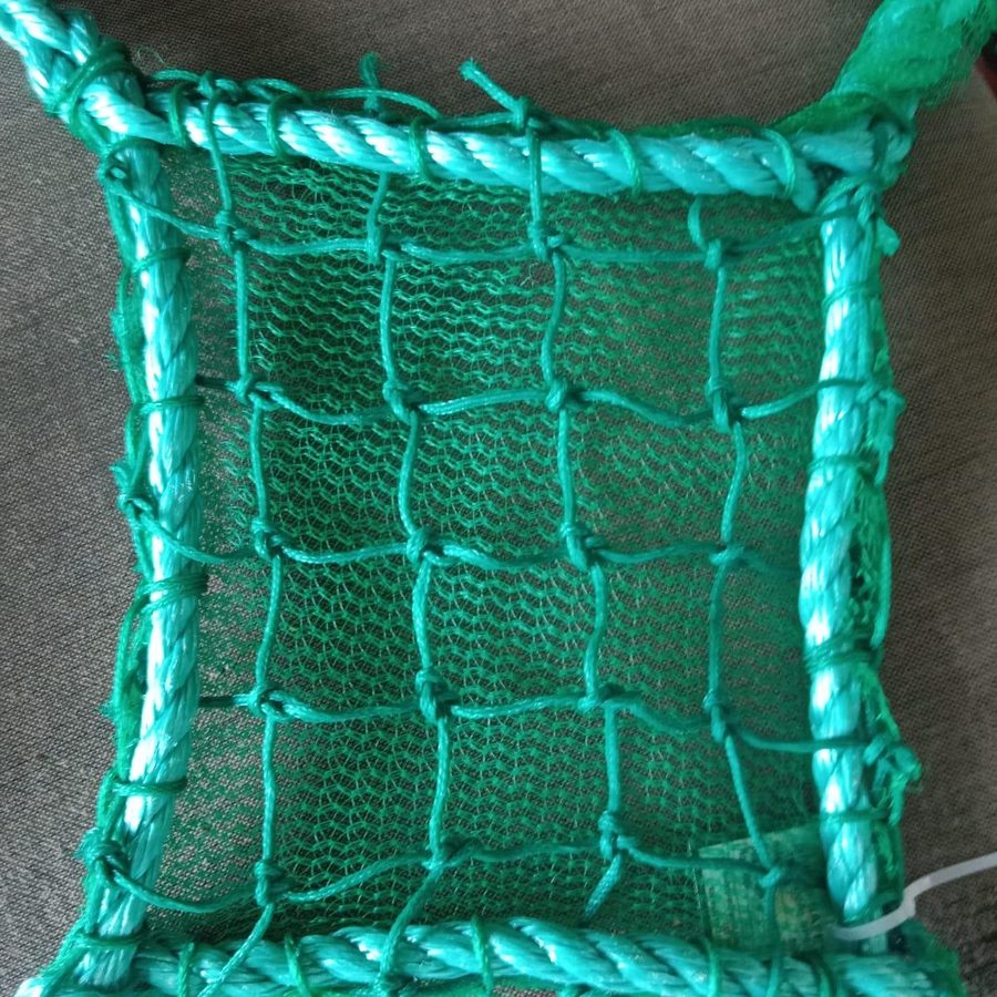 Balcony safety net fitted to a residential balcony railing